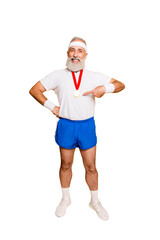 Obraz premium Full length of active cool funny competitive grandpa showing off his reward. Body, health, care, lifestyle, game, challenge, champ, hero, leisure, training, workout, strength, power, motivation, pride