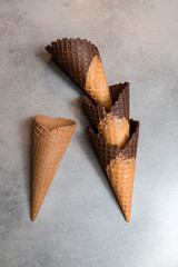 Top view of three empty ice cream cones. Soft focus