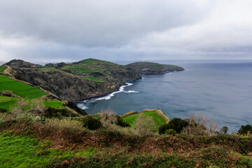 Fototapeta na wymiar São Miguel island in the Azores with the beautiful landscapes and green filds