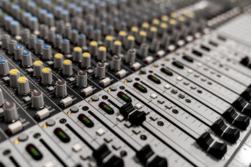 Mixer control. Music engineer. Backstage controls on an audio mixer, Sound mixer. Professional audio mixing console with lights, buttons, faders and sliders. sound check for concert. 