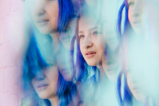 Multiple image of woman with blue dyed hair