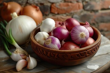 Variety of Onions and Garlic in Wooden Bowl