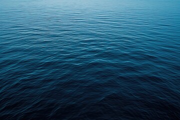 Naklejka premium Calm Ocean Water Surface at Dusk