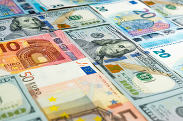 Fototapeta na wymiar Background made of dollar and euro banknotes