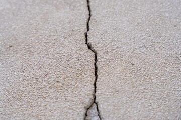 common problem in the walls of many buildings, huge big crack between walls, close of view of a crack, wall crack.