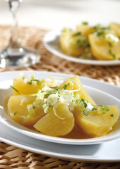 Boiled potatoes with aromatic herb dressing