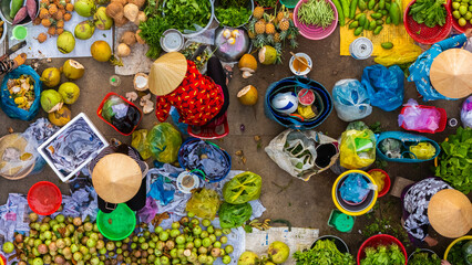 Aerial view of busy local daily life of the morning local market in Vi Thanh or Chom Hom market, Vietnam