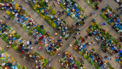 Aerial view of busy local daily life of the morning local market in Vi Thanh or Chom Hom market, Vietnam