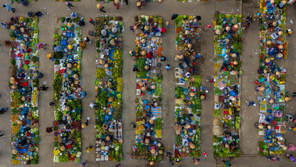 Aerial view of busy local daily life of the morning local market in Vi Thanh or Chom Hom market, Vietnam