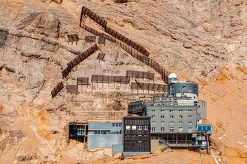 Alpine summer view with a science observatory at Schneeferner glacier, Zugspitzplatt, Mount Zugspitze, Top of Germany, Garmisch-Partenkirchen, Bavaria, Germany