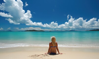 Obraz premium Young pretty woman sunbathing on the amazing sandy beach. Happy holiday theme.
