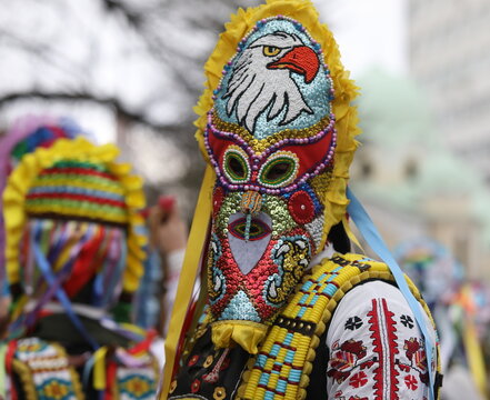 Pernik, Bulgaria - January 27, 2024: The 30th International masquerade festival Surva in Pernik, Bulgaria. People with mask called Kukeri dance and perform to scare the evil spirits.