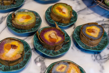 Tet tray. Full of traditional dishes. Chinese new year festival table with asian food. Vietnamese food for Tet holiday in lunar new year. Text on food meaning happy and peaceful.