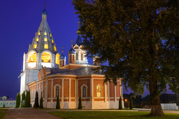 Ancient Church of the Tikhvin Icon of the Mother of God with a bell tower on a June night. Kolomna. Moscow region, Russia