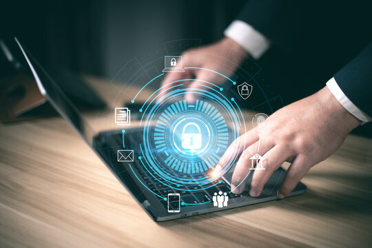 Businessman using laptop computer with digital padlock on internet technology networking with cloud computing and data management, Cyber security network. Data protection concept. cybersecurity.