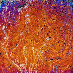 Colorful liquid mixture, blending paints in dynamic abstract fluid texture background, close up shot. Artistic, surreal and psychedelic design concept.
