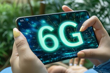 Interactive holographic 6g text icon on mobile phone in hands, futuristic concept