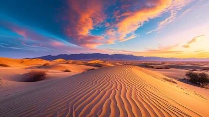 Gordijnen A desert landscape at sunset with long shadows and vibrant colors across the sand dunes. © Legano