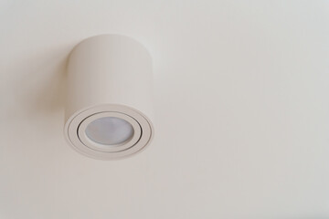 White spot light on the stretch ceiling