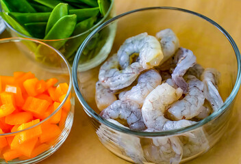 Mix of ingredients for stir fry, green pea. Homemade fresh fried vegetables for restaurant, menu, advert or package, close up, selective focus. Top view.