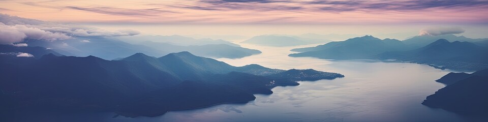 Fototapeta na wymiar an aerial photo from an airplane of a lake mountains