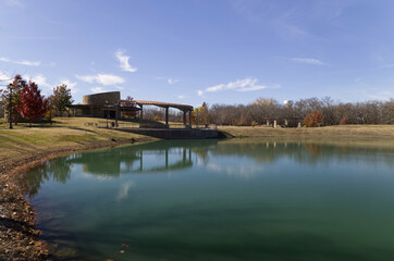 Fototapeta na wymiar Blue green lake in public park