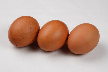 eggs in a basket on white background
