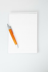 notepad and pencil, notebook and pen, notebook and pencil