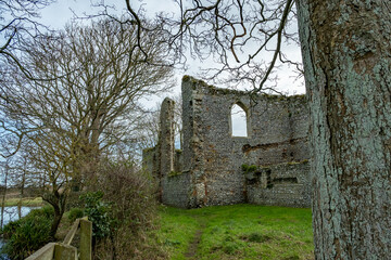 Fototapeta na wymiar The ancient and abandoned ruins of a priory in the Norfolk countryside