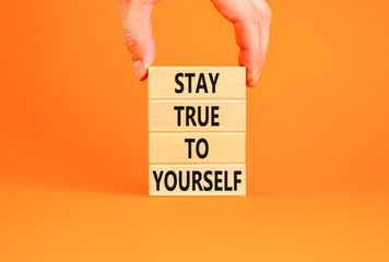 Stay true to yourself symbol. Concept word Stay true to yourself on beautiful wooden block....