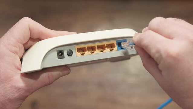 Connecting Internet cable connector to router