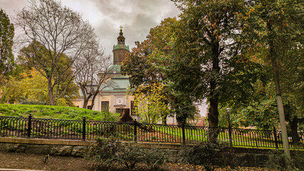 Beautiful shot of a church surrounded by lush foliage in Stockholm