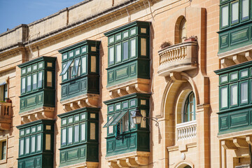 Enclosed wooden balconies in Malta