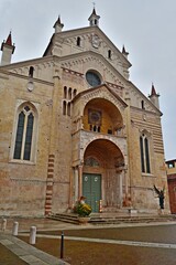 external facade of the cathedral of Santa Maria Assunta located in the historic center of Verona in Italy