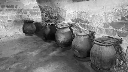 antique olive oil jars in cave, 