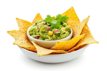 Guacamole dip with chips in a white bowl on white background