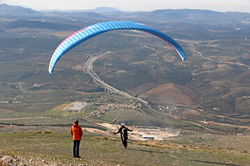 Paraglider in the Mountains above Loja in Spain	