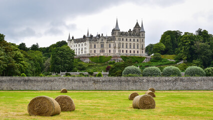 Dunrobin castle and gardens, straw bales outside the castle wall, Scotland landmark, United Kingdom, travel Europe