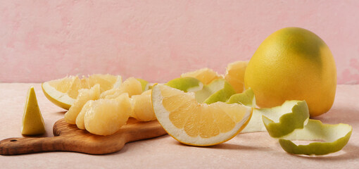 Tasty ripe pomelo on table