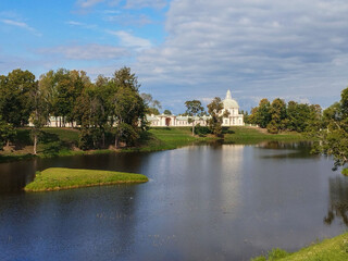 Fototapeta na wymiar Lower pond overlooking the Great Menshikov Palace. Oranienbaum. Lomonosov. Saint Petersburg. Russia
