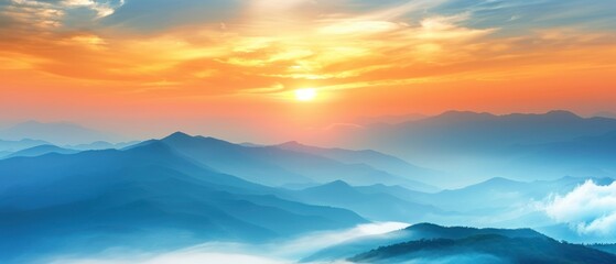 Obraz premium Mountain cloud and foggy at morning time with orange sky, sunrise beautiful landscape