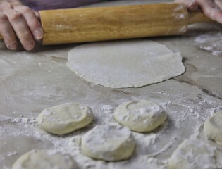 Cooking homemade food from dough on the table. 
