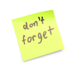 Sticky note with text DON'T FORGET on white background
