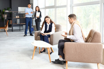 Business people negotiating in conference hall