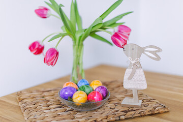 Easter decor and colorful eggs on the table