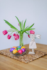Easter decor and colorful eggs on the table