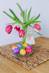 Easter decor and colorful eggs on the table