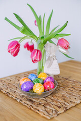 Easter decor and colorful eggs on the table