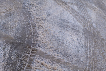 tyre tracks in winter on black ice
