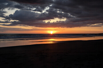 Naklejka na ściany i meble Sunset over the Pacific Ocean